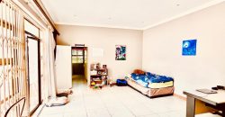 Timeless Charm Meets Modern Potential: A Versatile Oasis Awaits in a Desirable Neighborhood