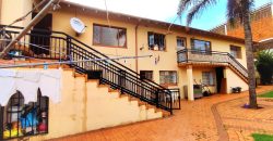 Welcome to an ideally positioned income-generating, multi-dwelling space!