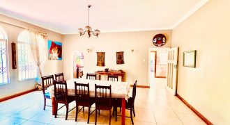 Timeless Charm Meets Modern Potential: A Versatile Oasis Awaits in a Desirable Neighborhood