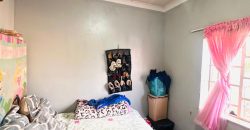 Spacious 3-Bedroom Home with Cottage and Ample Parking