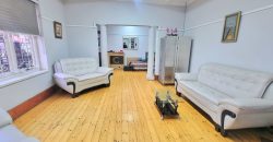 Neat 3-Bedroom Home with Income-Generating Cottage