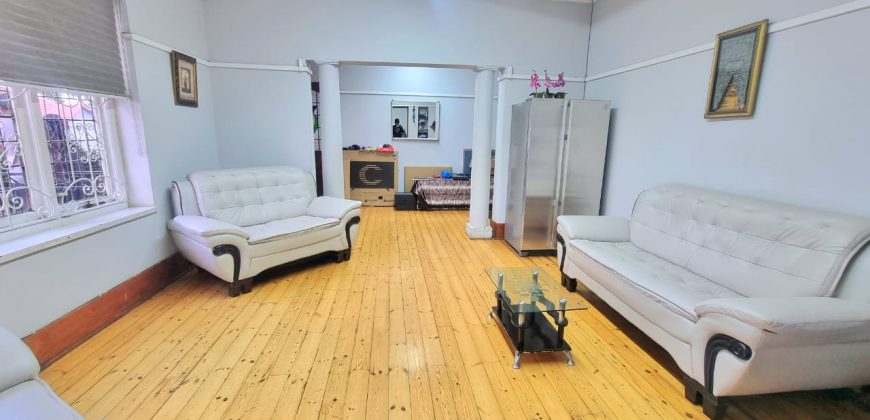 Neat 3-Bedroom Home with Income-Generating Cottage