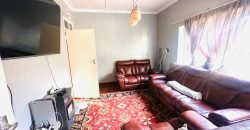 Spacious 3-Bedroom Home with Cottage and Ample Parking