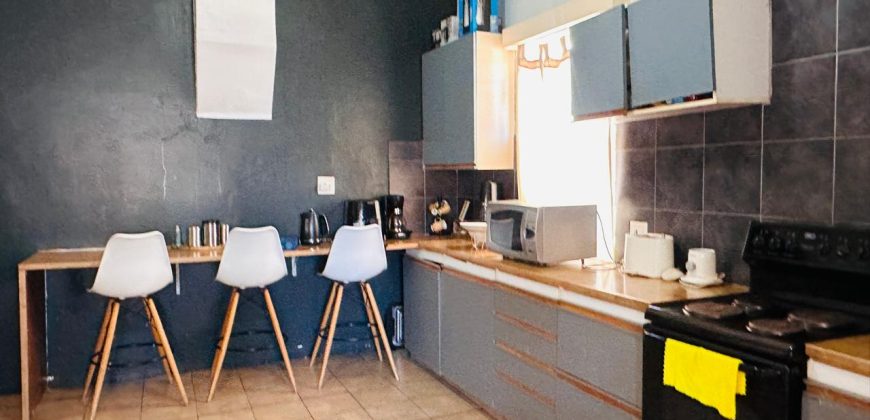 Spacious 4-Bedroom Home with Study and Parking