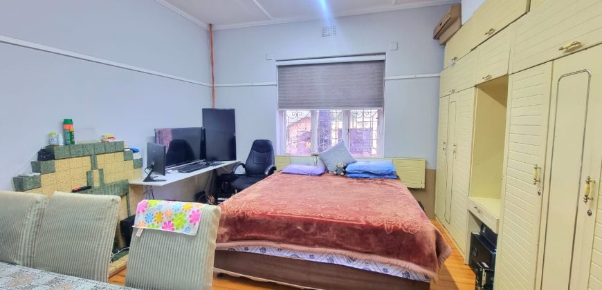 Neat 3-Bedroom Home with Income-Generating Cottage