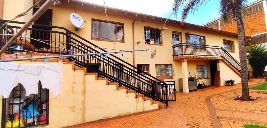 Welcome to an ideally positioned income-generating, multi-dwelling space!