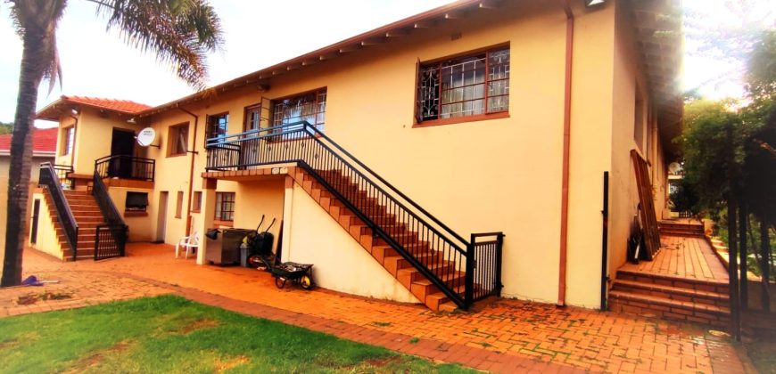 Welcome to an ideally positioned income-generating, multi-dwelling space!