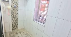 Neat 3-Bedroom Home with Income-Generating Cottage