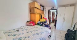 Neat 3-Bedroom Home with Income-Generating Cottage