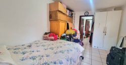 Neat 3-Bedroom Home with Income-Generating Cottage