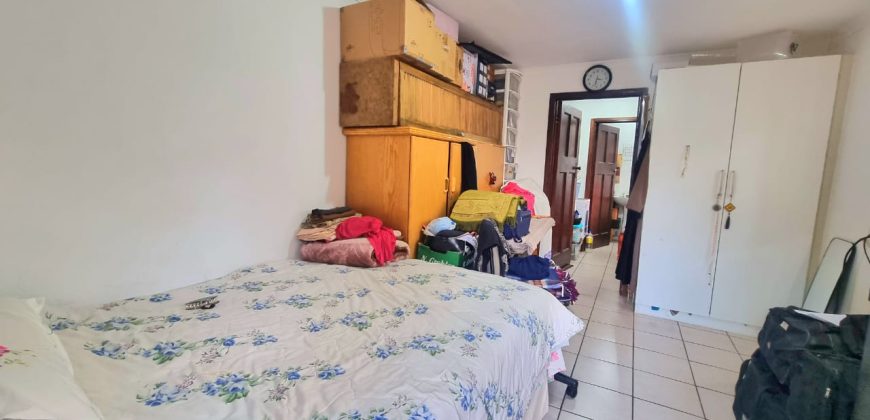 Neat 3-Bedroom Home with Income-Generating Cottage