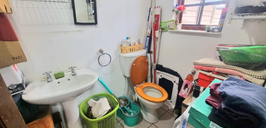 Neat 3-Bedroom Home with Income-Generating Cottage