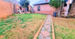 Neat 3-Bedroom Home with Income-Generating Cottage