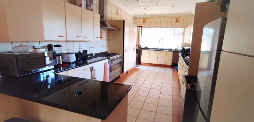 Welcome to an ideally positioned income-generating, multi-dwelling space!