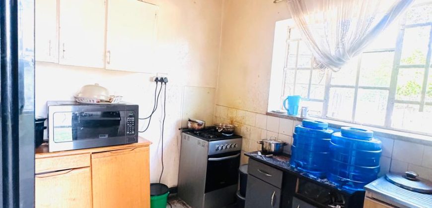 Spacious 3-Bedroom Home with Cottage and Ample Parking