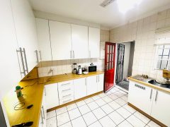 Secure 2 bedroom home with income-generating cottage