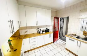 Secure 2 bedroom home with income-generating cottage