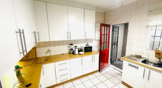 Secure 2 bedroom home with income-generating cottage
