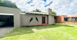 Secure 2 bedroom home with income-generating cottage