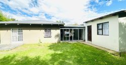 Secure 2 bedroom home with income-generating cottage