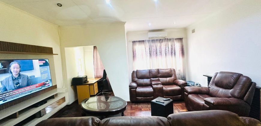 Secure 2 bedroom home with income-generating cottage