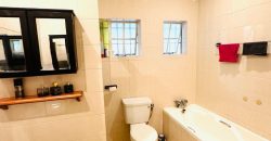 Secure 2 bedroom home with income-generating cottage