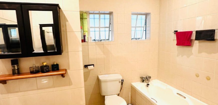 Secure 2 bedroom home with income-generating cottage