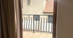 Modern 2-bedroom townhouse with private yard & double garage
