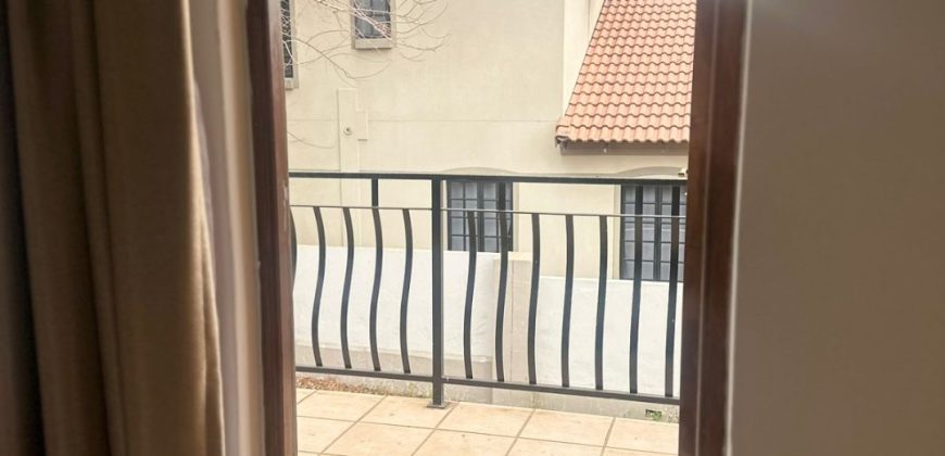 Modern 2-bedroom townhouse with private yard & double garage