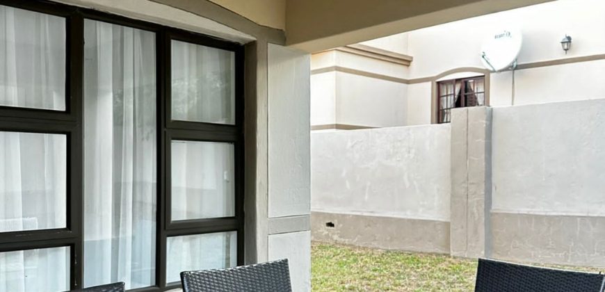 Modern 2-bedroom townhouse with private yard & double garage