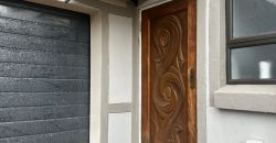 Modern 2-bedroom townhouse with private yard & double garage