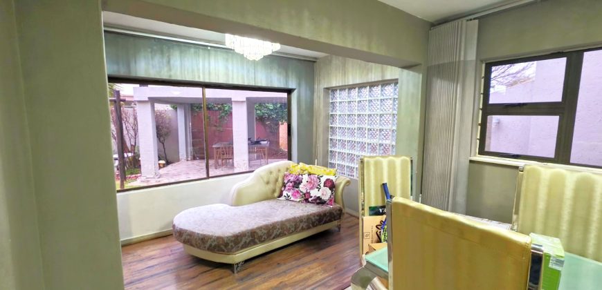 Spacious large home spread over double plot
