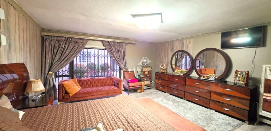 Spacious large home spread over double plot