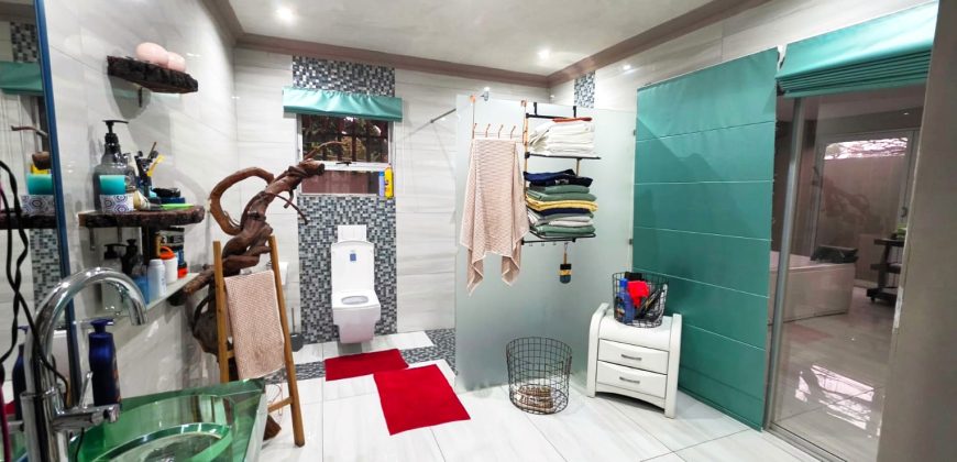 Spacious large home spread over double plot