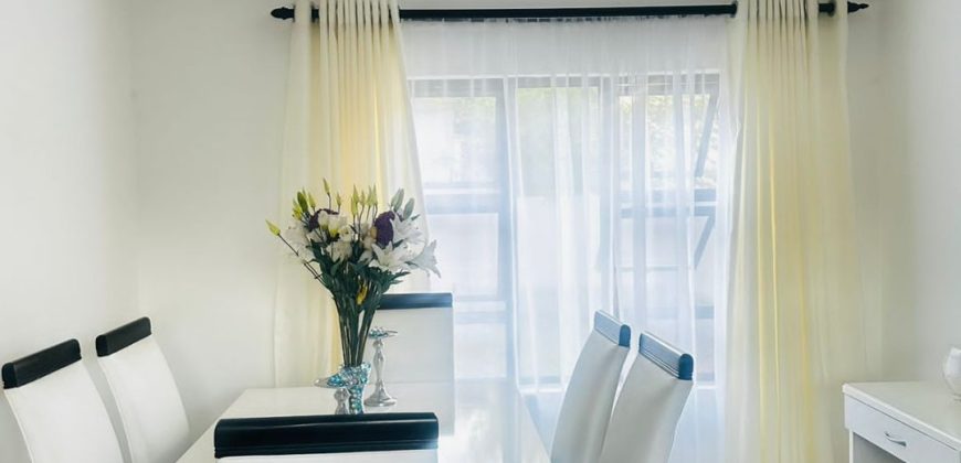 Modern 2-bedroom townhouse with private yard & double garage
