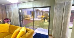 Spacious large home spread over double plot