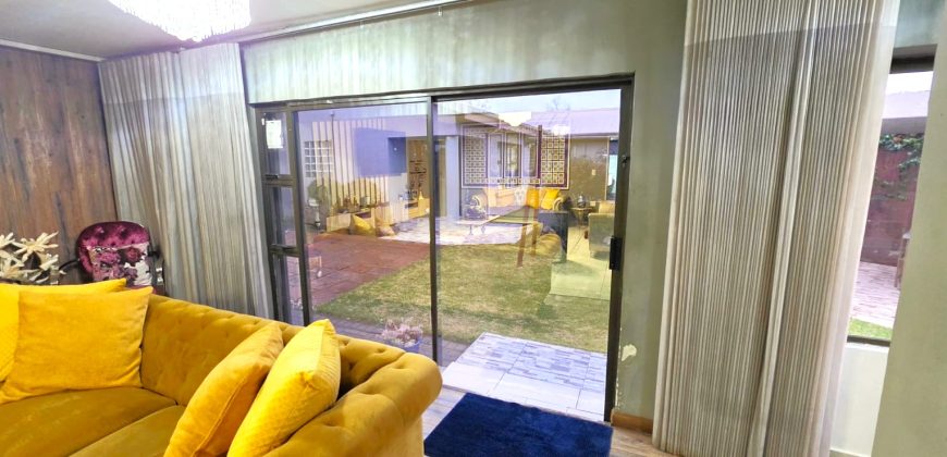 Spacious large home spread over double plot