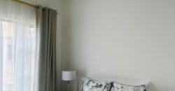 Modern 2-bedroom townhouse with private yard & double garage