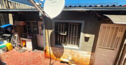 Guest house with multiple rooms, shops and entertainment area!