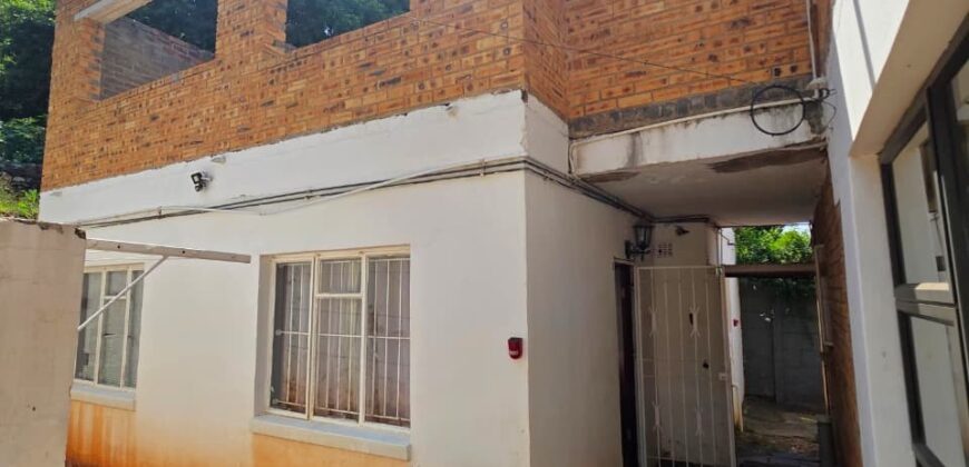 Spacious family home with a separate cottage in Cyrildene