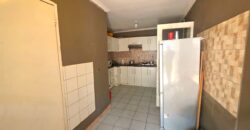 Guest house with multiple rooms, shops and entertainment area!